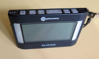 Amplicomms TCL 210 Travel clock gives audio and, or vibration alarm.  It is also a timer, thermometer and torch.